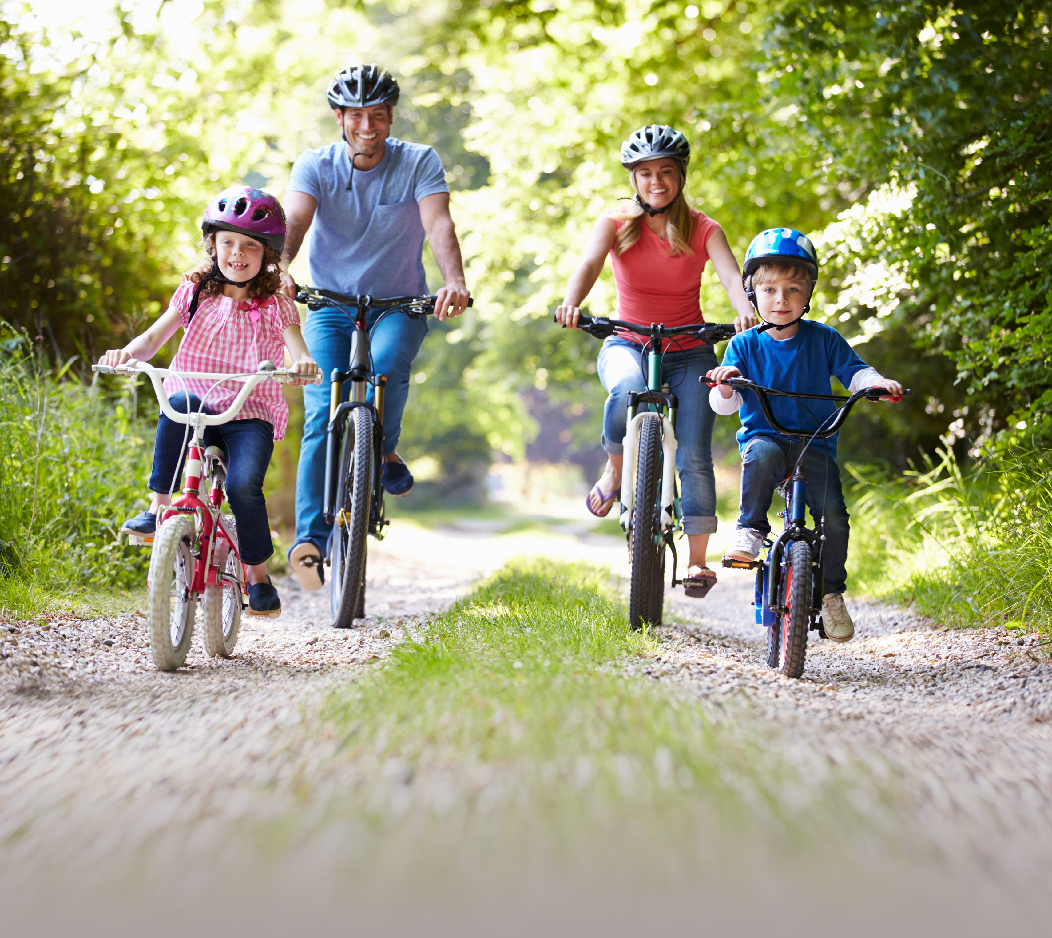 Family On Cycle Ride In Countryside